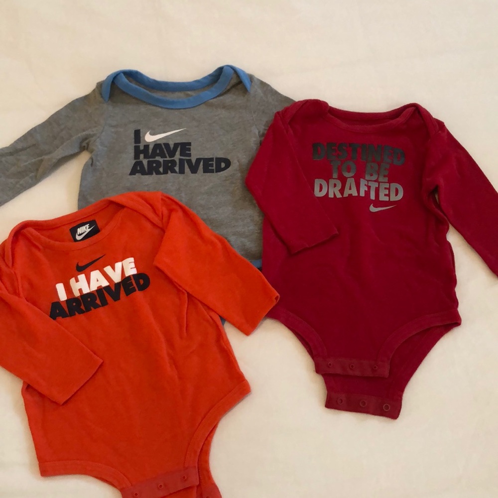 Nike baby body suits, set of three!